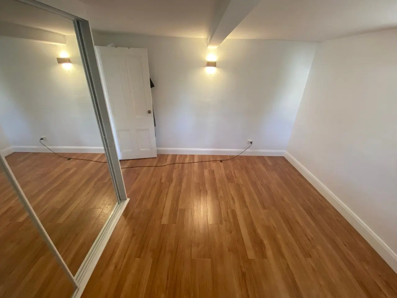 Timber floorboards laid by Trusted in a freshly painted room